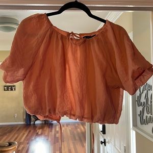 Pink crop top with open back